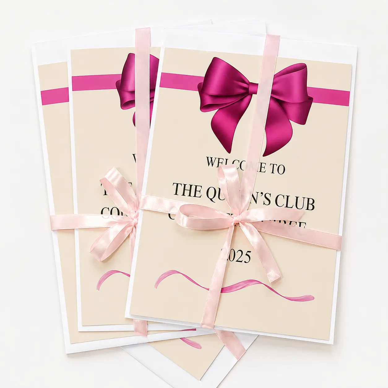 Printed event welcome cards tied with ribbon